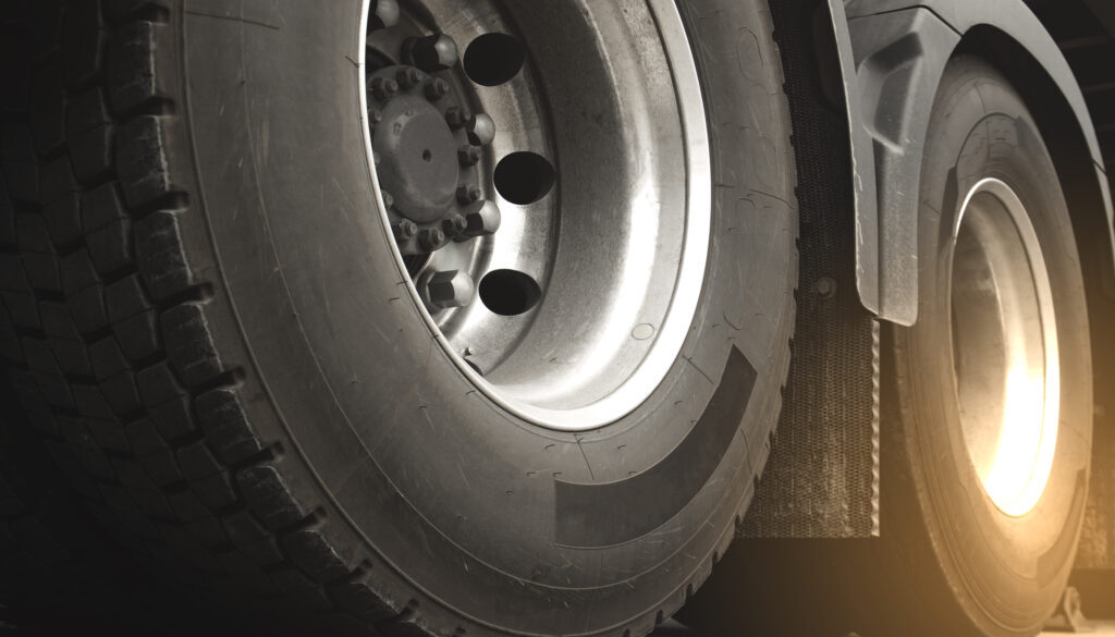 closeup-truck-wheels-trailer-truck-freight-industry-transportation