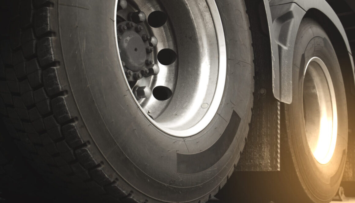 closeup-truck-wheels-trailer-truck-freight-industry-transportation